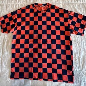 Zara. Bright orange and blue checkered soccer jersey